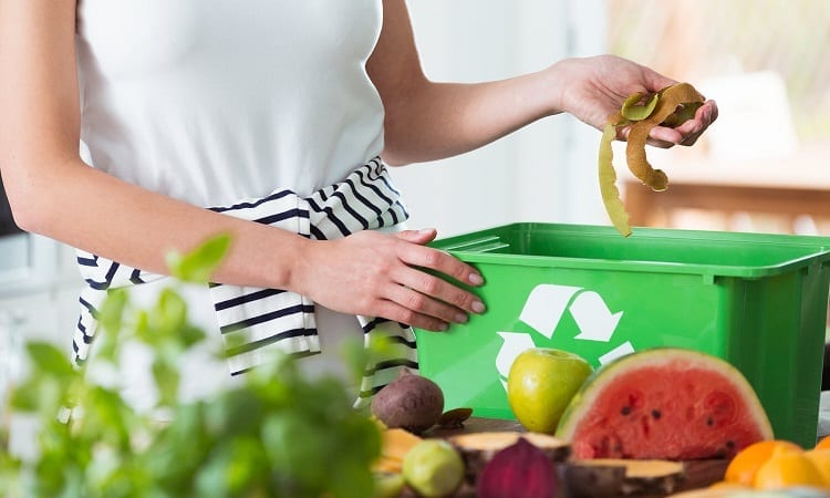 Woman Throwing Food Waste