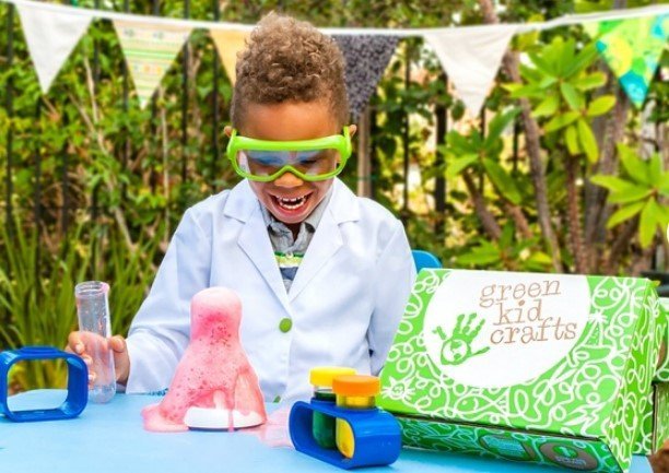 Child enjoying products from the Green Kid Crafts Box