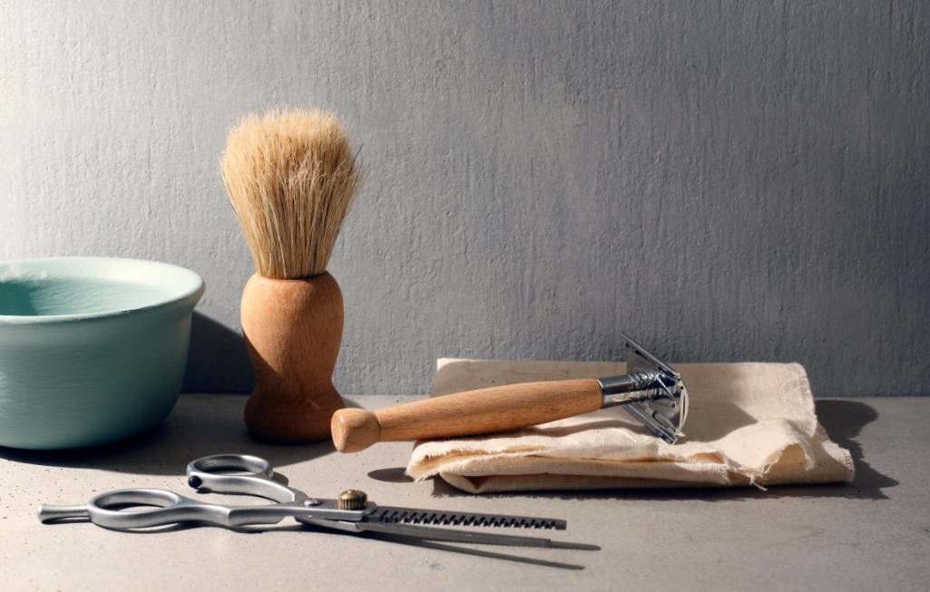 Eco Swaps - Safety Razor, wooden shaving brush and metal scissors - Image from Canva