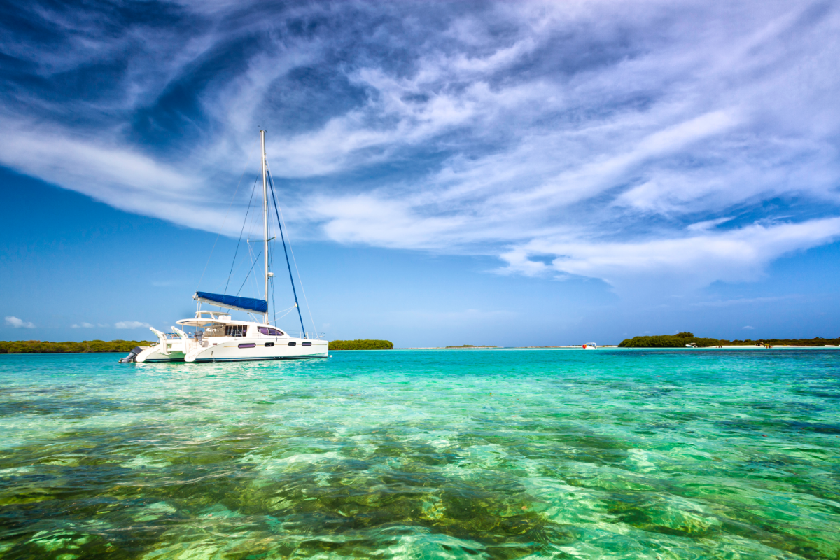Solar Boats - Stock image of a yacht on blue water