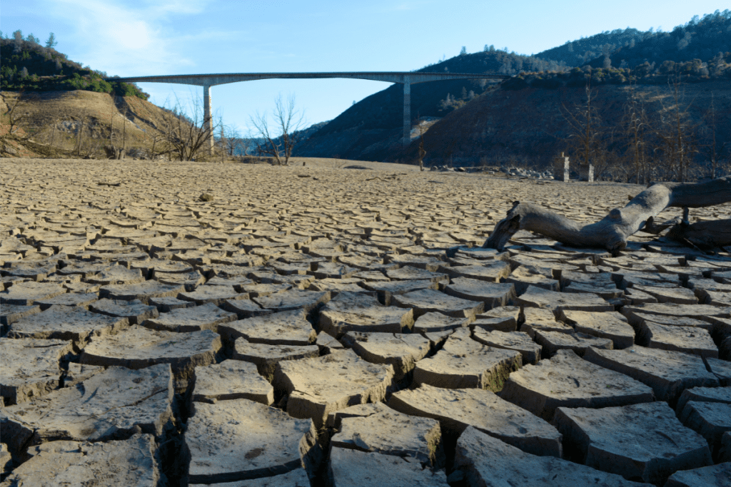 Ways to Conserve Water - Californa Drought - Dry River Bed Under New Melones Bridge