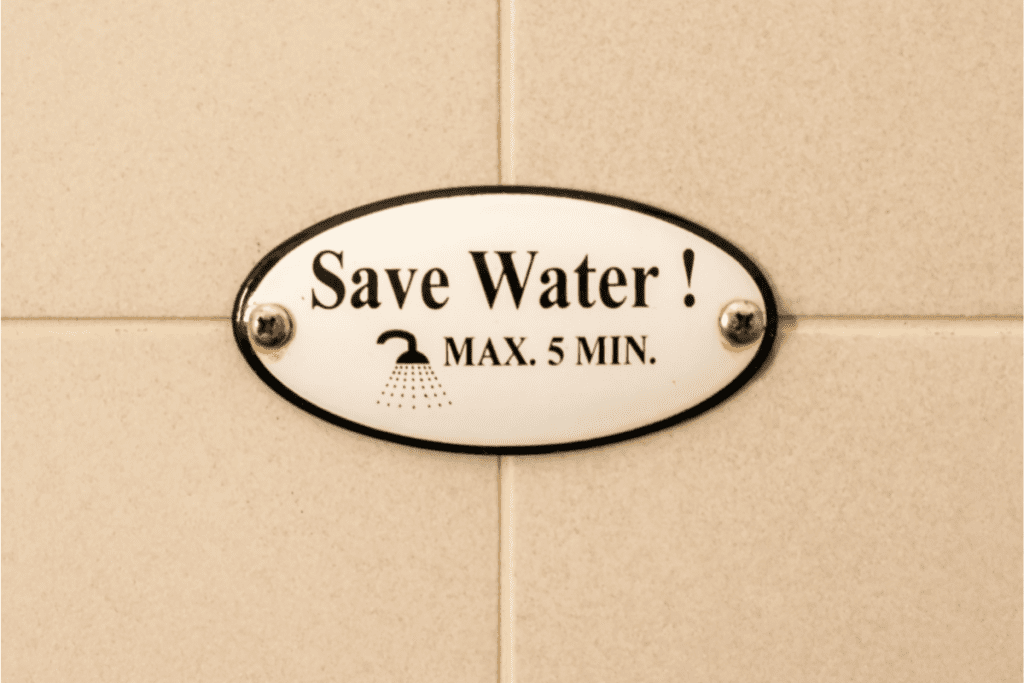 Ways to Conserve Water - Sign that says max 5 min Showers