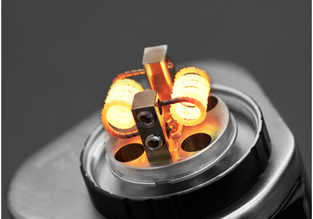 Recycling vapes - image of an exposed vape coil, glowing red hot