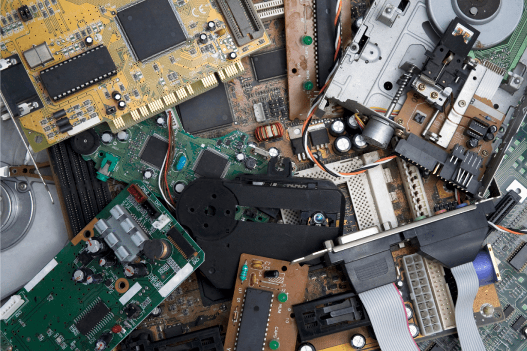 Environmental Impact of Cryptocurrency - Stack of electronic Waste from Computers