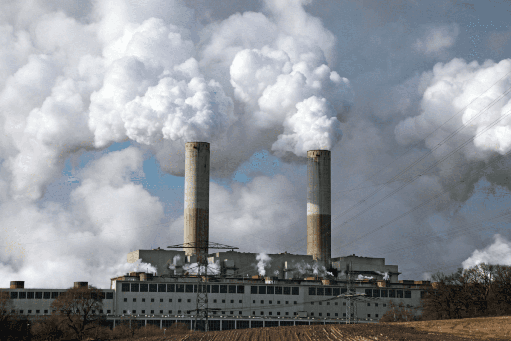 Environmental Impact of Cryptocurrency - Smoke stacks from a coal burning power plant 