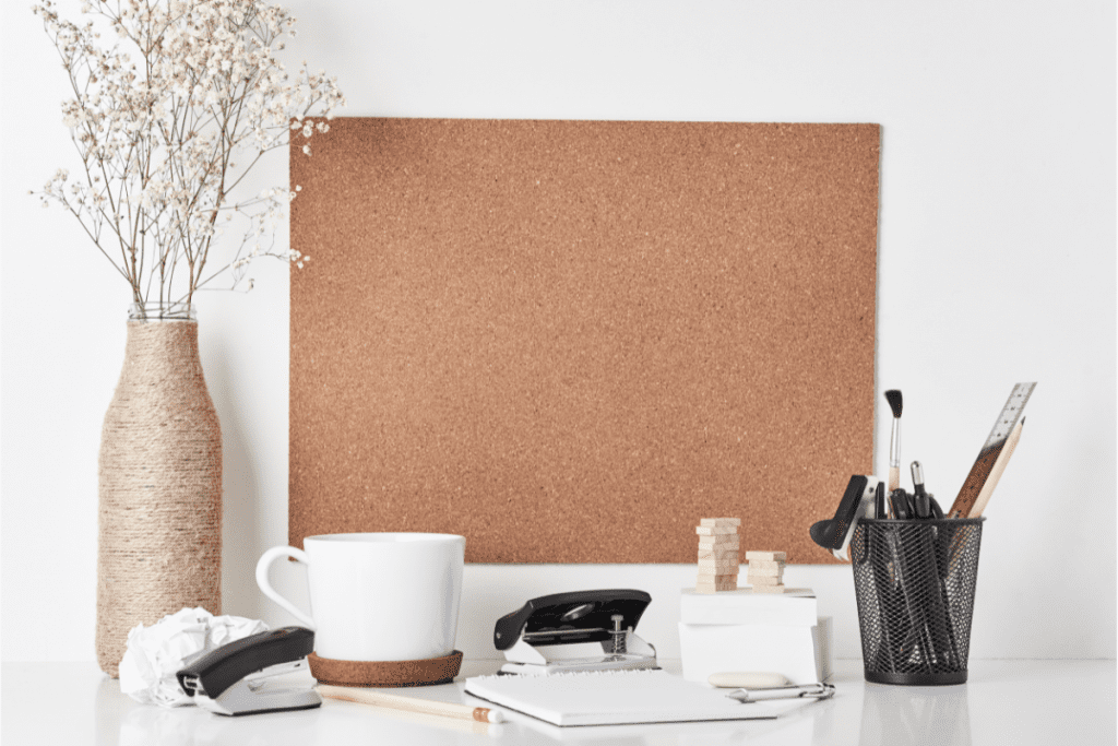 Socially Conscious Employee - image of an upcycled cork board and stationery