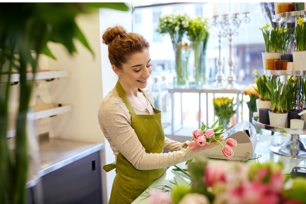 Jobs in Plant Biology - florist arranging flowers in a flower shop
