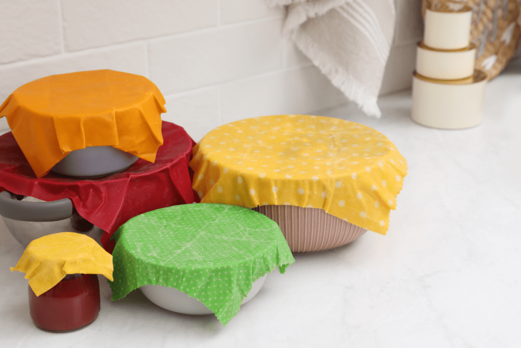 Eco-friendly Corporate Gifts - Reusable Beeswax Wraps covering bowls of food 