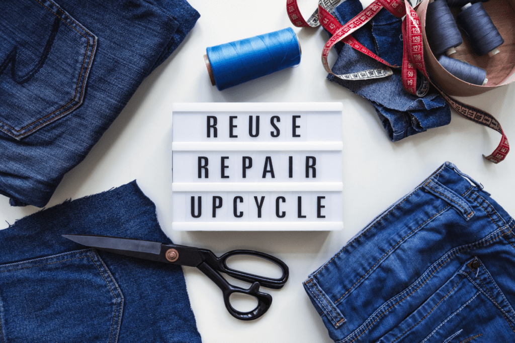 Off-grid Adventures - sign that says 'reuse, repair, upcycle'