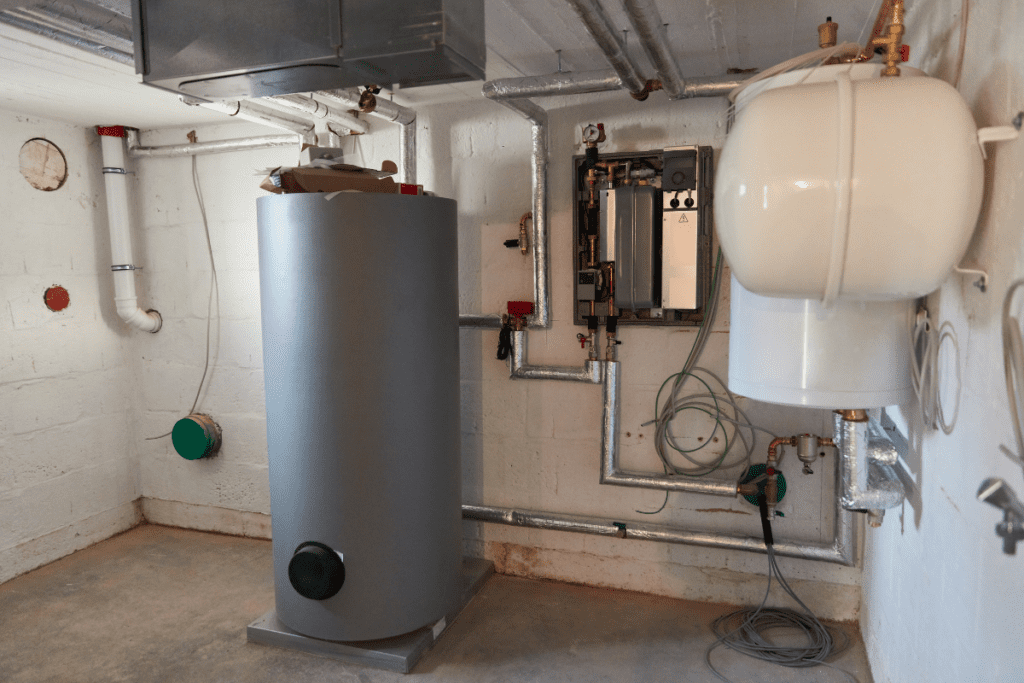 Energy Efficient Heating - Image of a boiler and heat pump in a boiler room