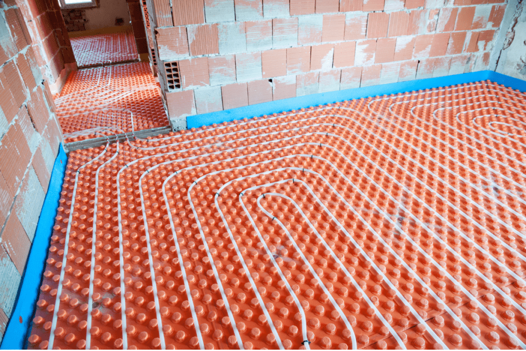 Energy Efficient Heating - Image of an exposed underfloor heating system during installation