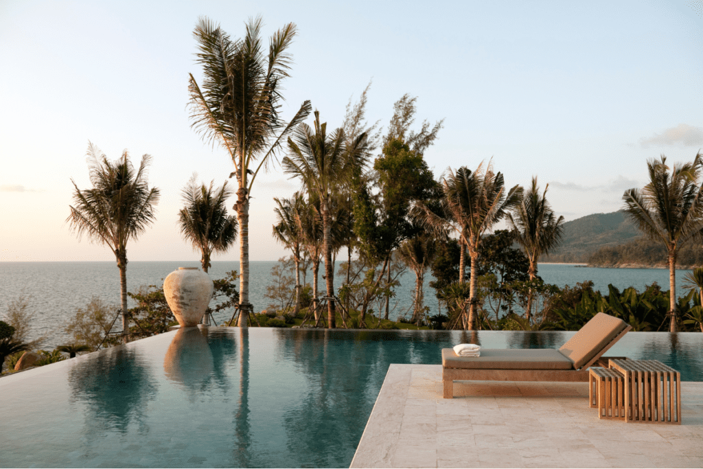 Eco-friendly Pool - Stock Image from Canva of a stone infinity pool