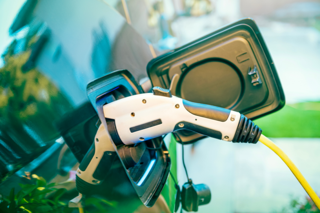 reasons to switch to an electric car - stock image from Canva of a car's charging port 