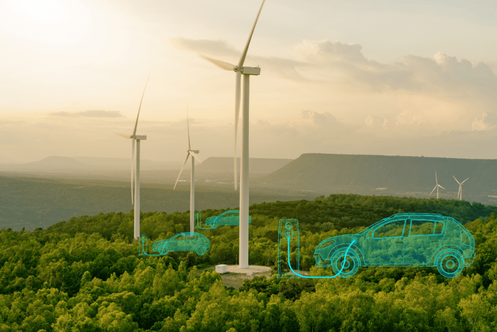 reasons to switch to an electric car - stock image from Canva of wind turbines with conceptual illustrations of cars charging beneath them 