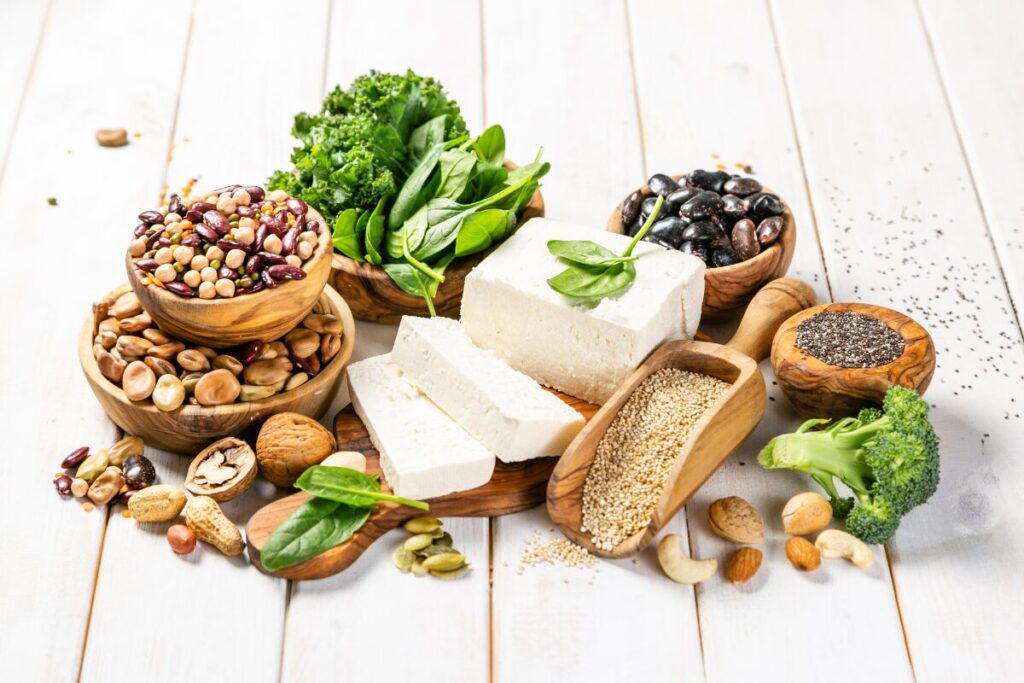 Selection of beans, nuts, legumes and blocks of tofu