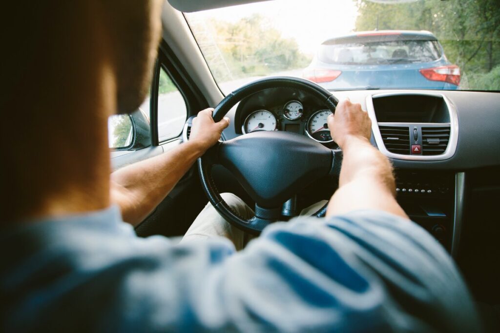 Man carefully driving on the road