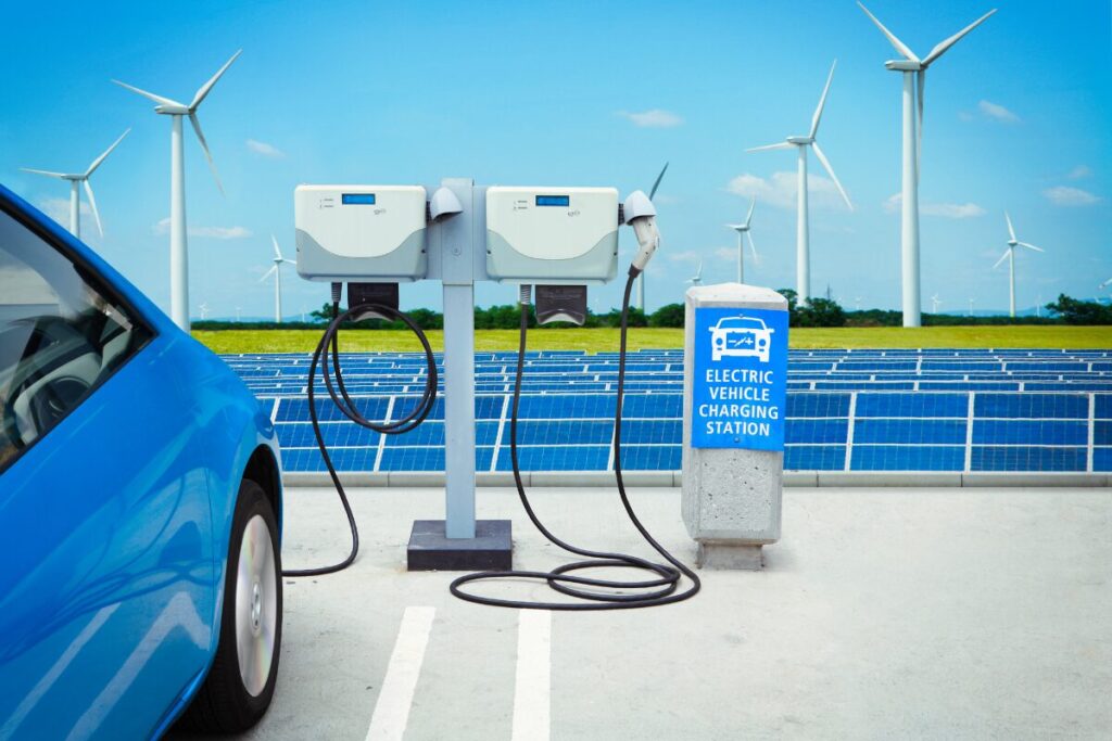 Blue Electric Car charging in solar panel port