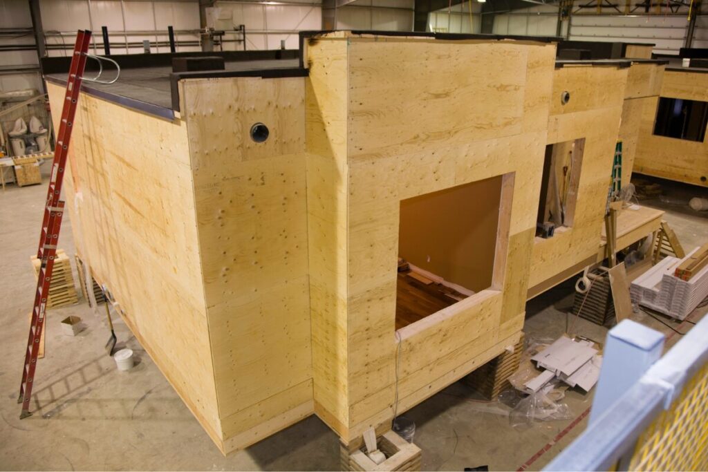 A raw modular home made of premium woods